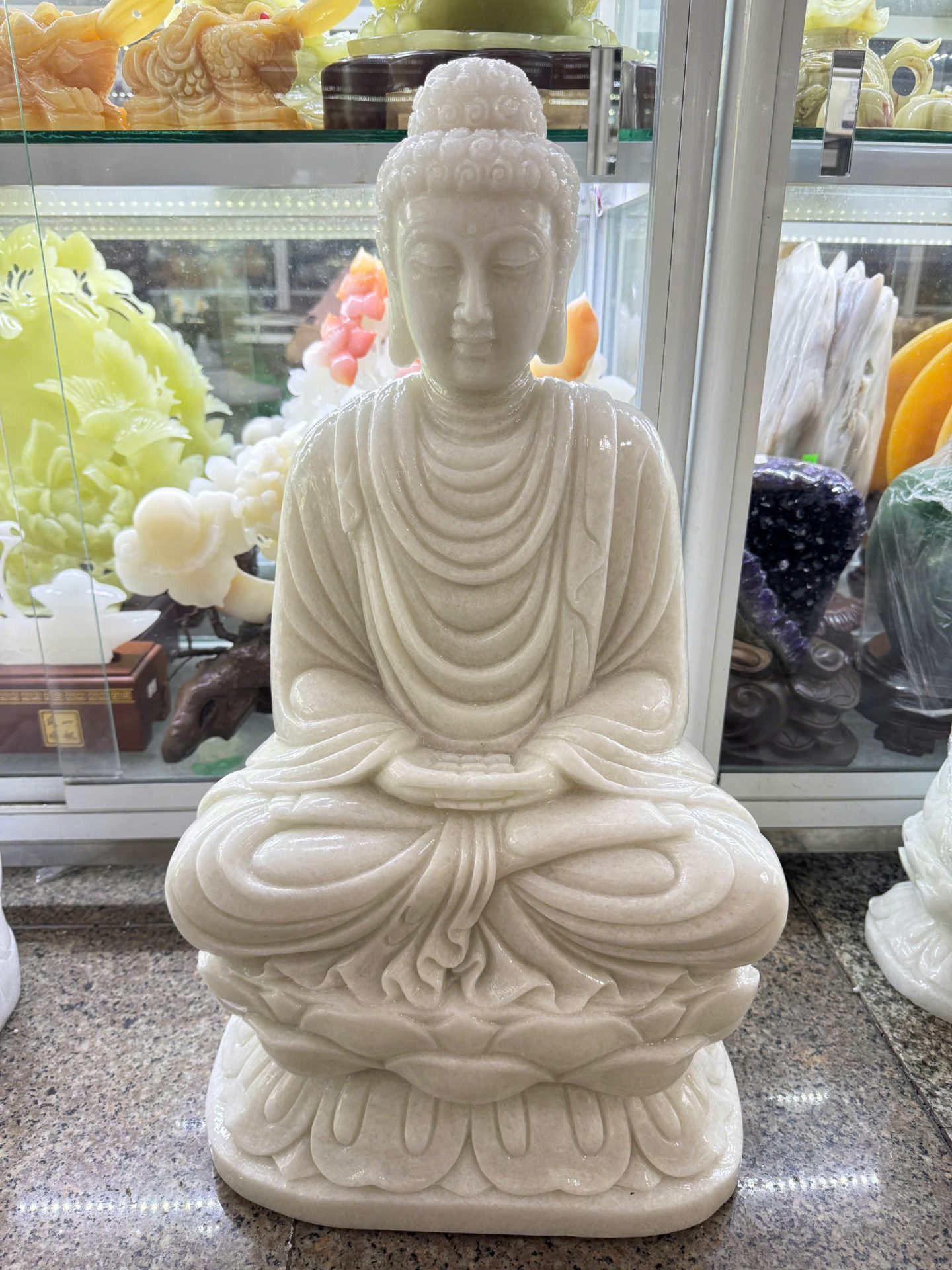 Tượng Phật Thích Ca Mâu Ni ngồi đài sen đá trắng – Cao 60 cm